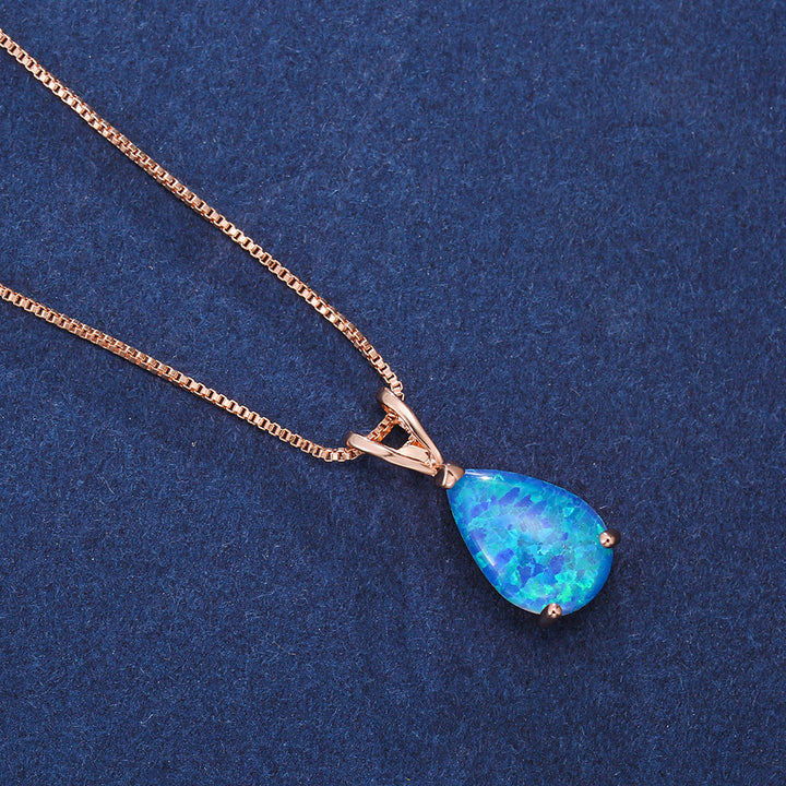Dainty silver opal drop pendant necklace. Adjustable chain, a beautiful women's jewelry gift.