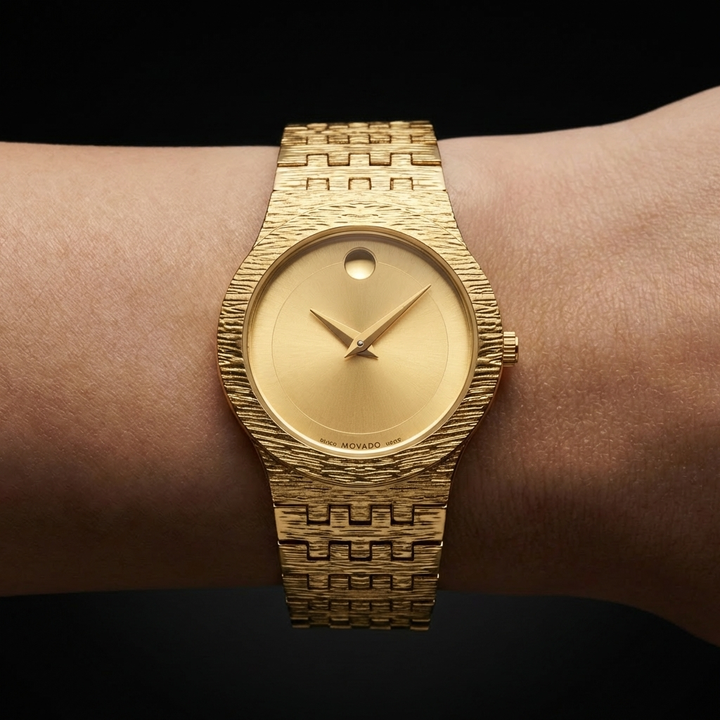 Elegant women's Seraphine watch, minimalist design with a delicate gold band and classic black face, a timeless accessory.