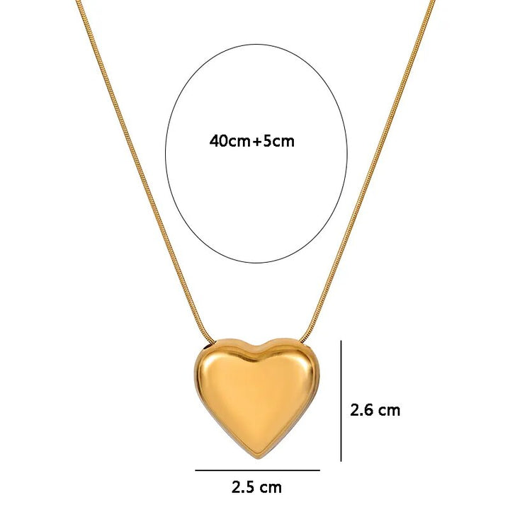 Simple elegant women's heart pendant necklace. Minimalist stainless steel jewelry, delicate fashion piece, gift for her.