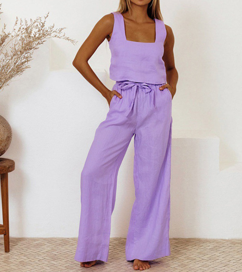 Stylish women's square neck top & wide-leg pants set in a minimalist design. Perfect for casual or elegant looks.