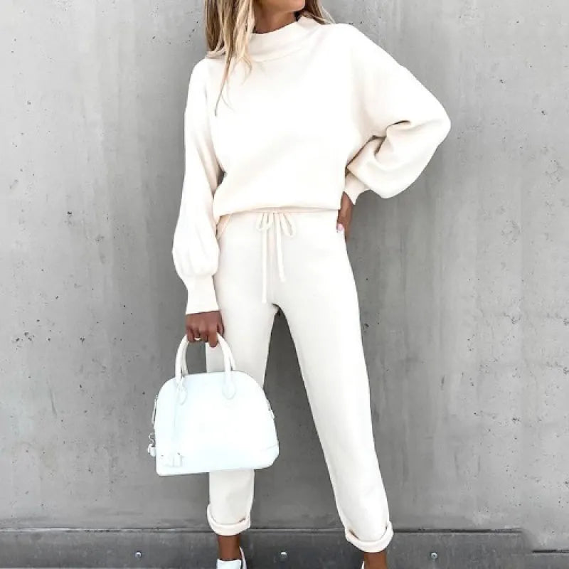 Chic women's matching set: mock neck top and drawstring loungewear pants. Perfect casual outfit.