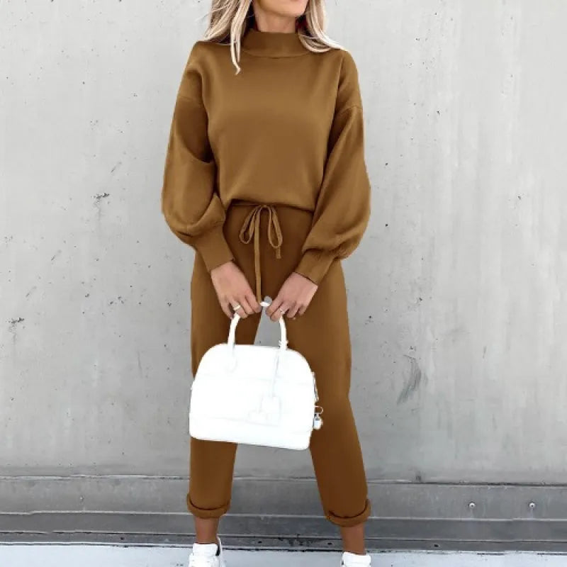 Cozy women's mock neck two-piece set with soft fabric and adjustable drawstring pants.
