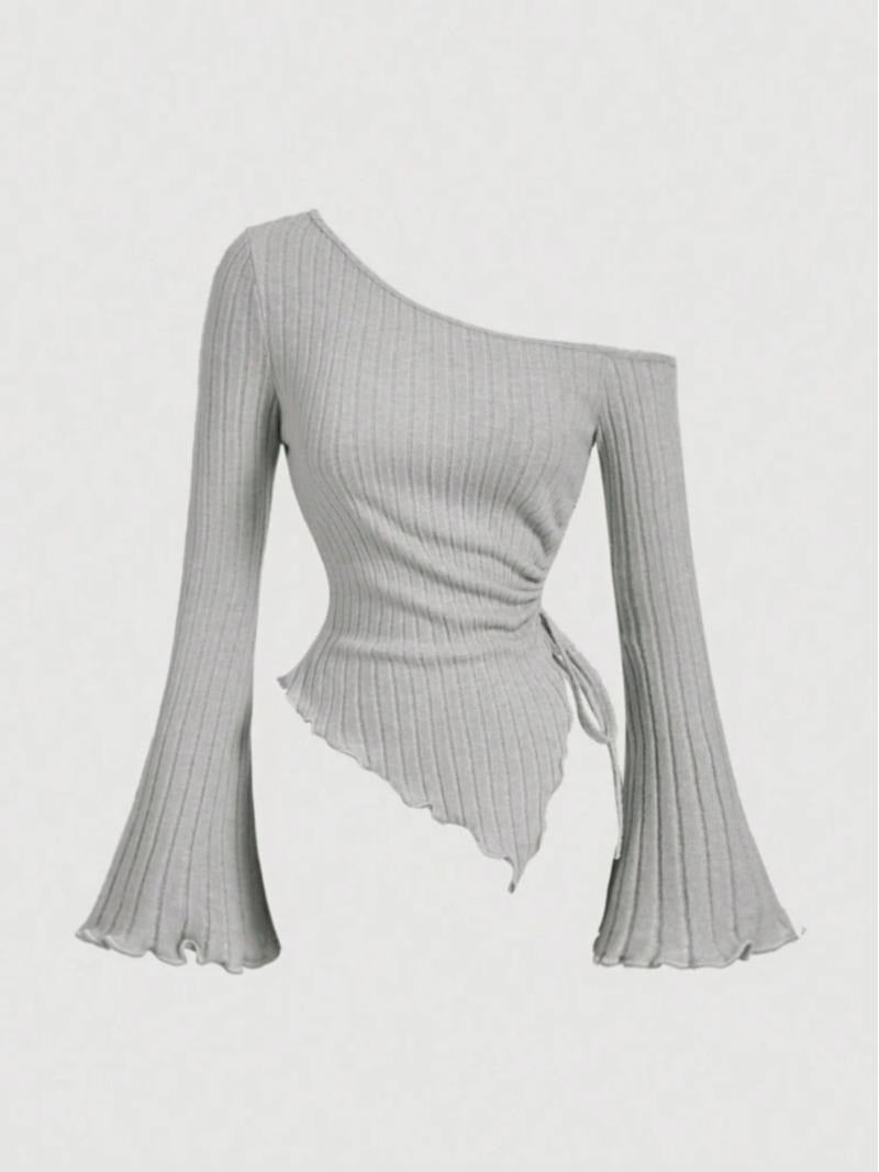 Fashionable women's asymmetric one-shoulder top. Modern, elegant, and flattering with a sculpted fit.