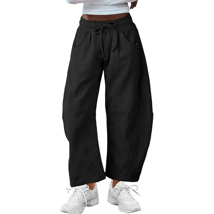 Women's modern barrel-leg pants with a relaxed fit, perfect for stylish everyday wear and comfort.