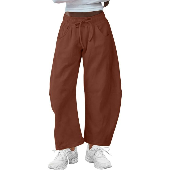 Comfortable women's barrel-leg trousers featuring a drawstring waist for an effortless, chic look.