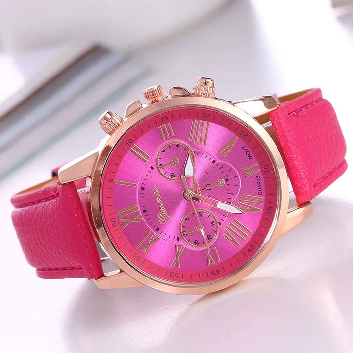 Stylish women's watch: a gold-tone chronograph with vibrant accents and Roman numerals.