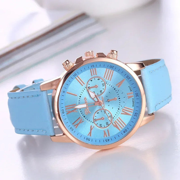Women's elegant chronograph watch; modern gold-tone design, colorful dial & Roman numerals.