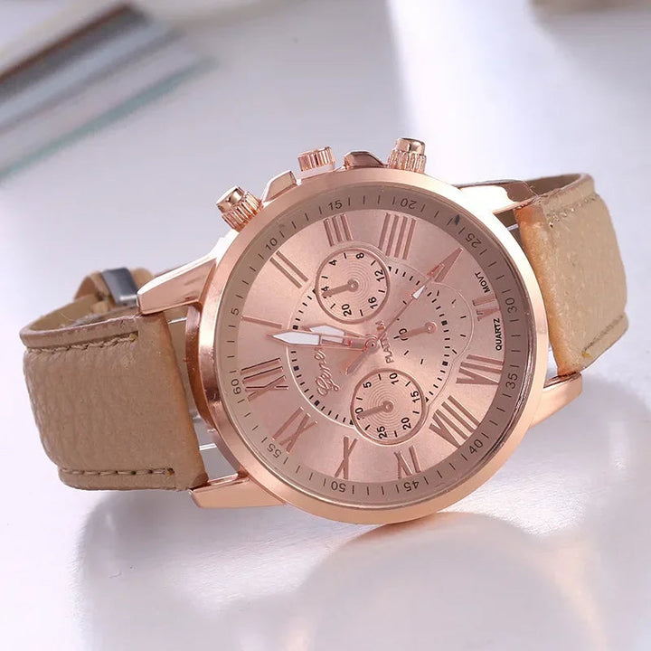 Sophisticated women's modern quartz watch. Gold-tone chronograph with elegant Roman numerals.