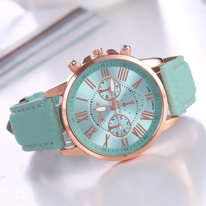 A vibrant women's fashion accessory: modern chronograph watch with gold-tone & Roman numerals.
