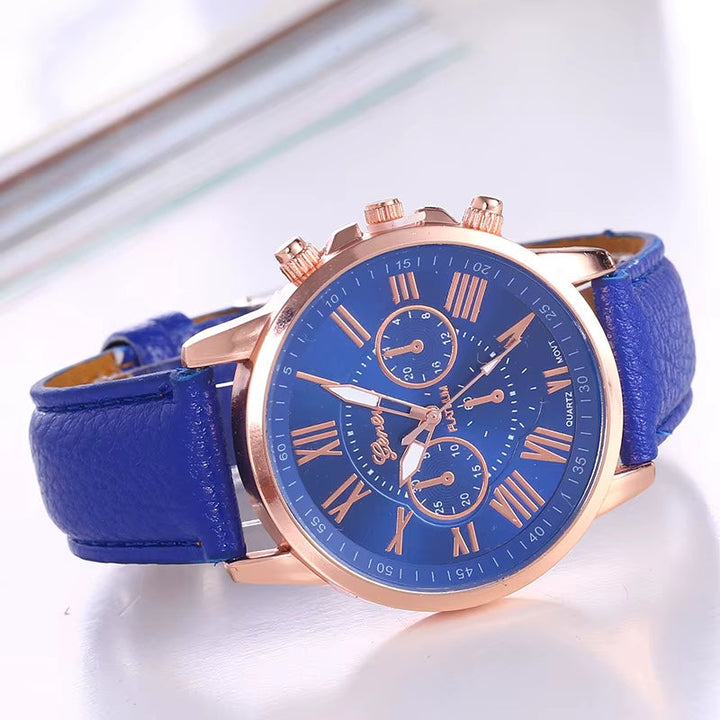 Gold-tone women's chronograph watch, a modern quartz timepiece with vibrant Roman numerals.