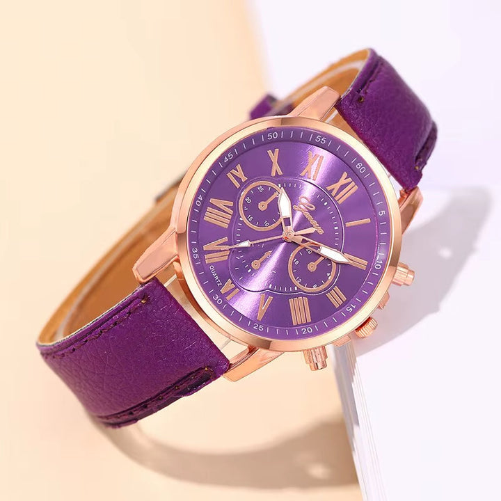 Elegant women's gold-tone chronograph watch featuring classic Roman numerals.