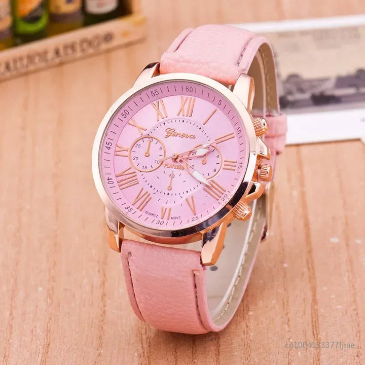 Women's elegant gold-tone chronograph watch, a modern timepiece with Roman numerals.