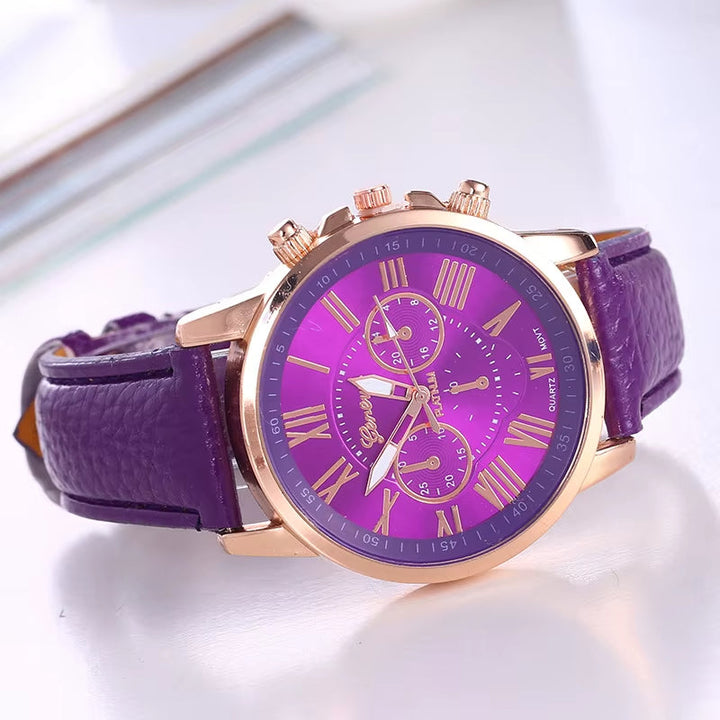 Colorful women's modern quartz chronograph watch featuring gold-tone details & Roman numerals.