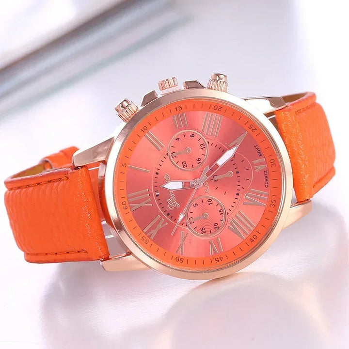 Modern women's chronograph watch. Vibrant, gold-tone design with classic Roman numerals.