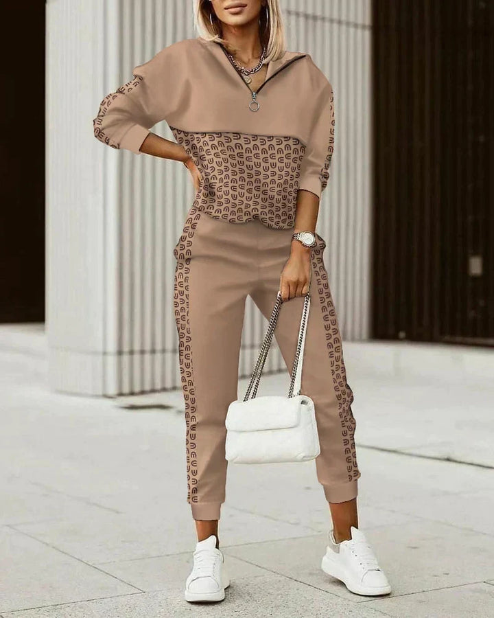 Matching women's modern comfort tracksuit set. Stylish two-piece loungewear for everyday casual and athleisure.