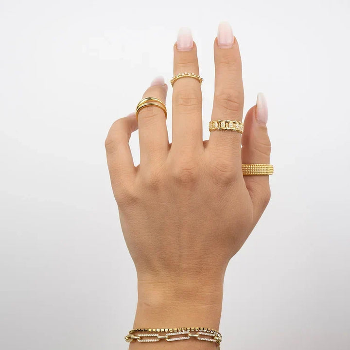 Women's modern double band ring in gold & silver. Minimalist, elegant, and stackable for everyday wear.