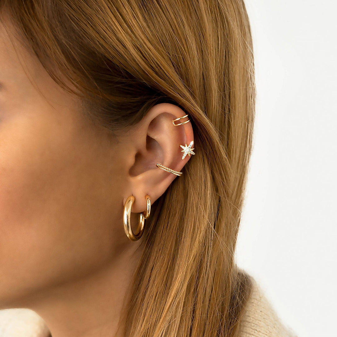 Elegant sterling silver half-round hoop earrings, modern minimalist style for versatile women's wear.
