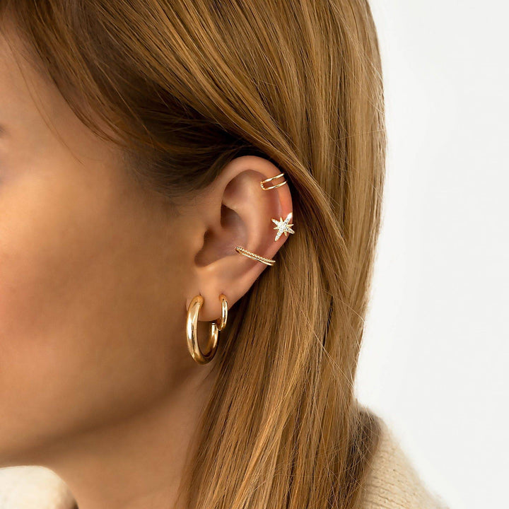 Elegant sterling silver half-round hoop earrings, modern minimalist style for versatile women's wear.