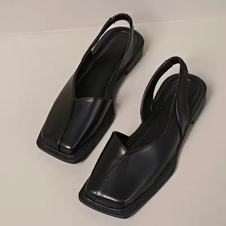 Women's comfortable slip-on flats with a modern square toe, perfect for casual and work wear.