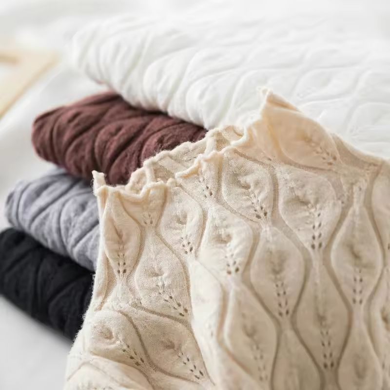 Warm, cozy women's moiré cashmere blend turtleneck sweater, essential for comfortable winter style.