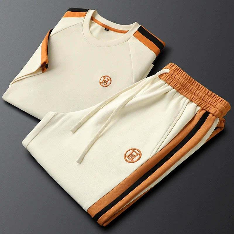 Woman wearing a stylish Monaco striped tracksuit set. Perfect for travel, loungewear, or casual outings.