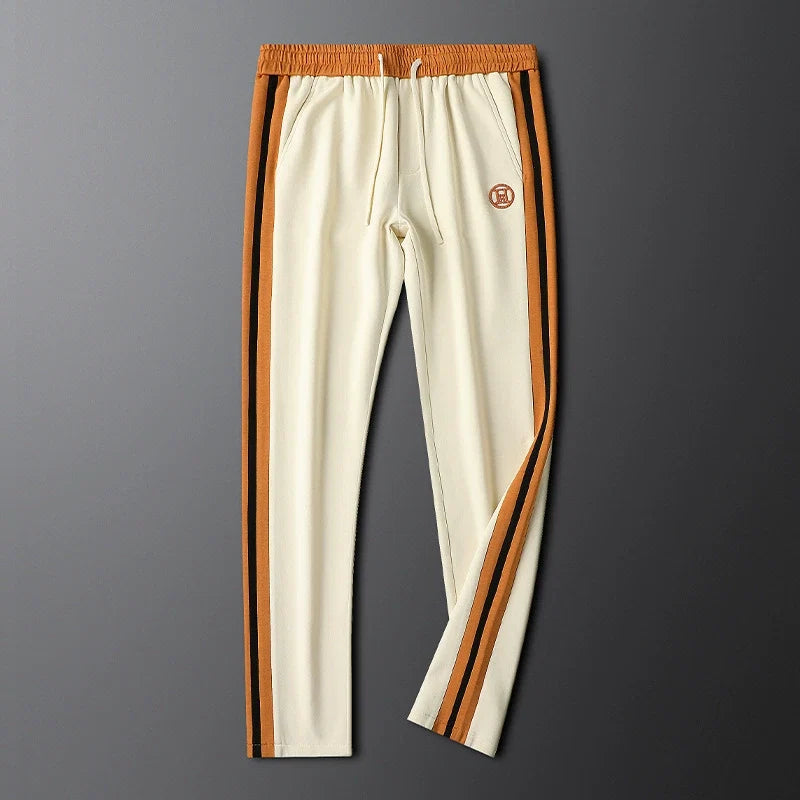 Women's Monaco Luxe striped two-piece tracksuit set. Elegant comfortwear for athleisure & casual style.