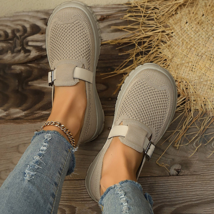 Women's slip-on loafers in beige, offering orthopedic support and a chic, casual look.