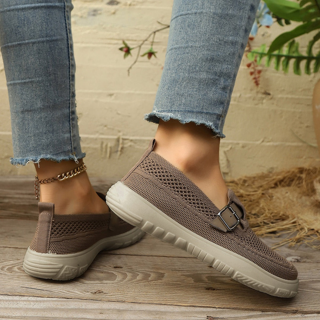 Versatile black women's orthopedic slip-on loafers, blending comfort with smart casual style.