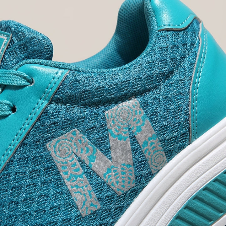 Close-up of women's Monica training shoe with breathable upper and supportive arch, non-slip design.