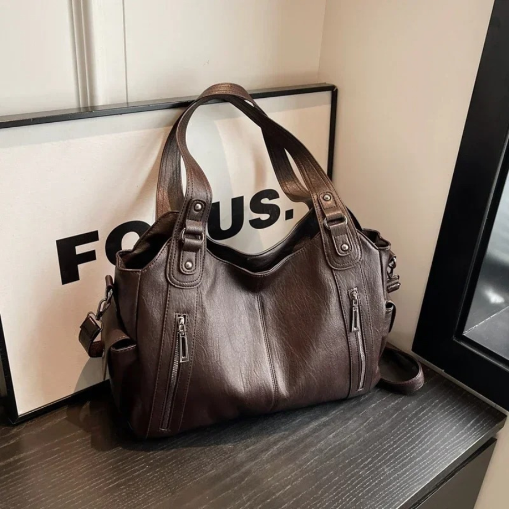 Brown multi-compartment women's shoulder bag. A versatile and organized accessory for work & travel.