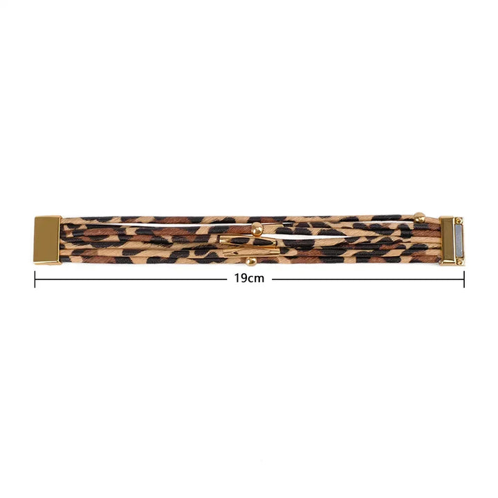 Detailed close-up of a women's multi-layer leopard print leather bracelet, showcasing its unique animal print.