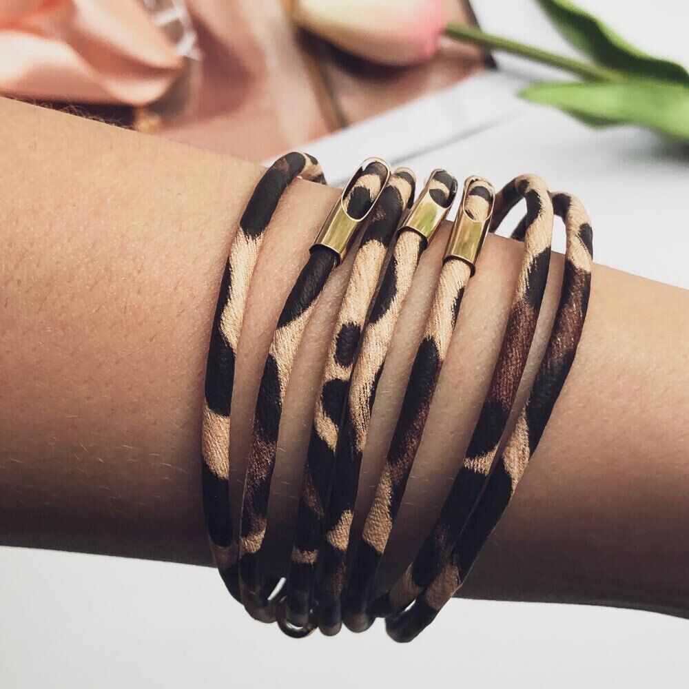 Women's multi-layer leopard print fashion bracelet, an adjustable wrist accessory with a practical magnetic clasp.
