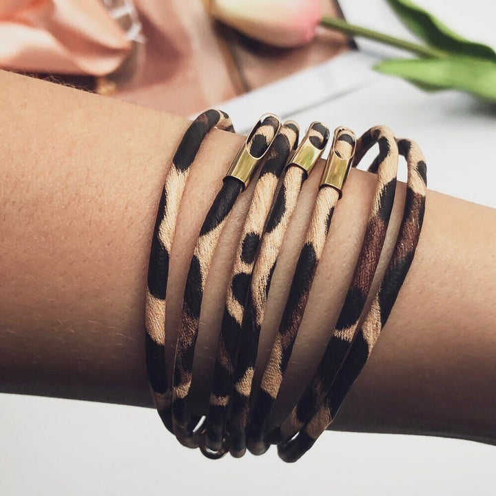 Women's multi-layer leopard print fashion bracelet, an adjustable wrist accessory with a practical magnetic clasp.