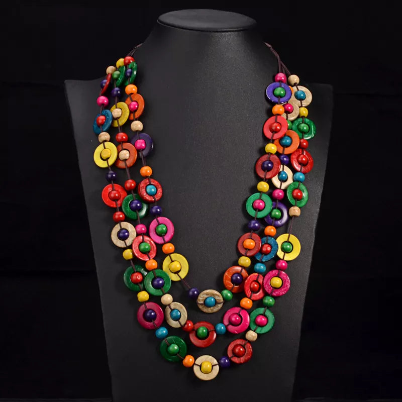 Women's multi-layered bohemian wooden bead necklace; natural boho chic fashion accessory.