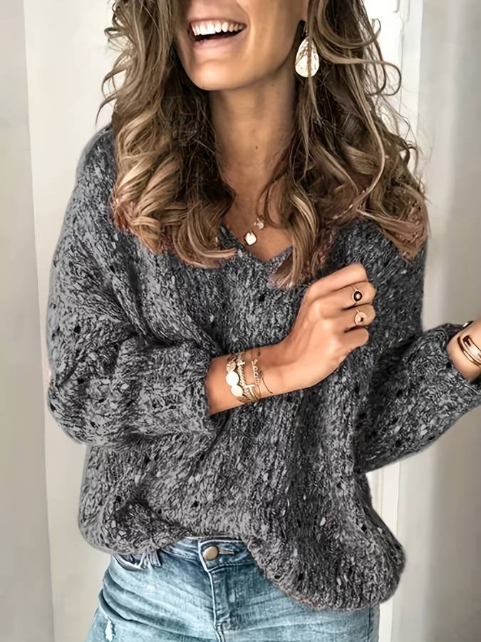 Casual women's multicolored loose fit pullover sweater, a comfortable and vibrant top.