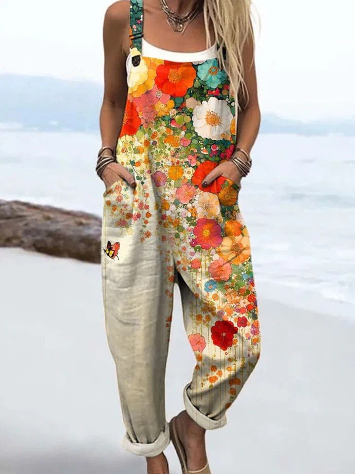 Women's multicolour floral wide leg sleeveless jumpsuit. Perfect for elegant summer fashion, casual wear & vacation.