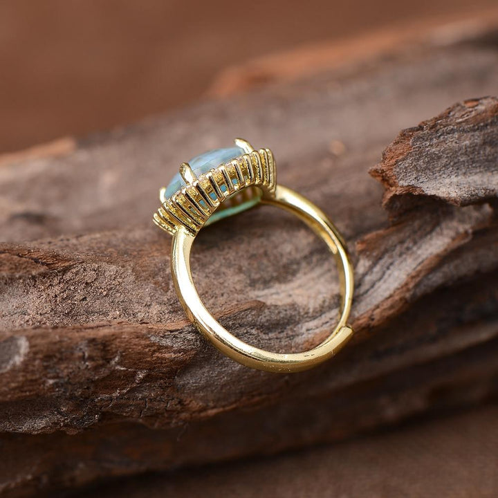 Stunning red opal cocktail ring for women, an adjustable and unique mystical gemstone jewelry piece.