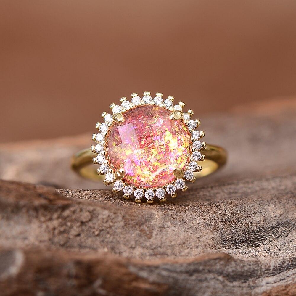 Mystical gemstone cocktail ring for women, featuring a vibrant opal; a unique and eye-catching accessory.