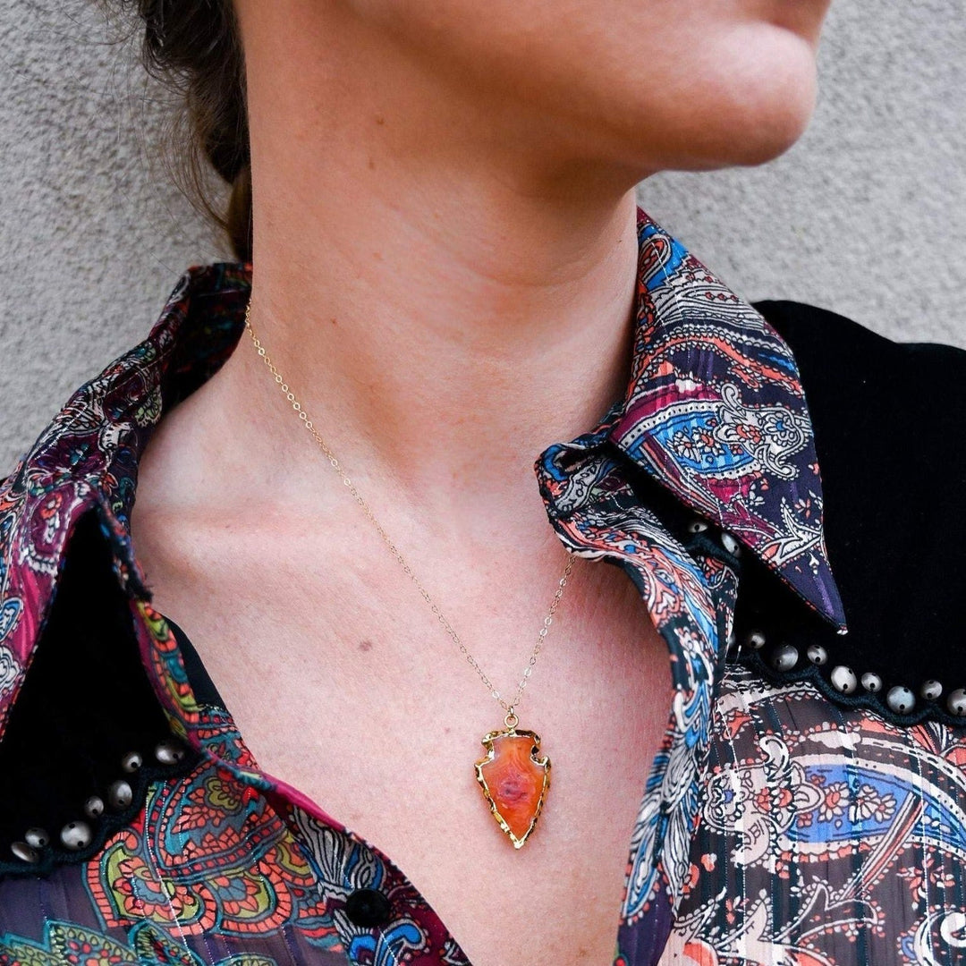 Obsidian arrowhead crystal pendant necklace for women. Protection and spiritual energy jewelry.