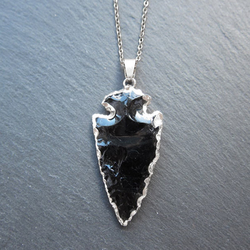 Women's natural crystal arrowhead pendant necklace. Healing gemstone jewelry.