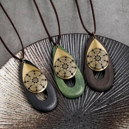 Unique women's bohemian wood necklace, natural oval pendant, eco-friendly jewelry.
