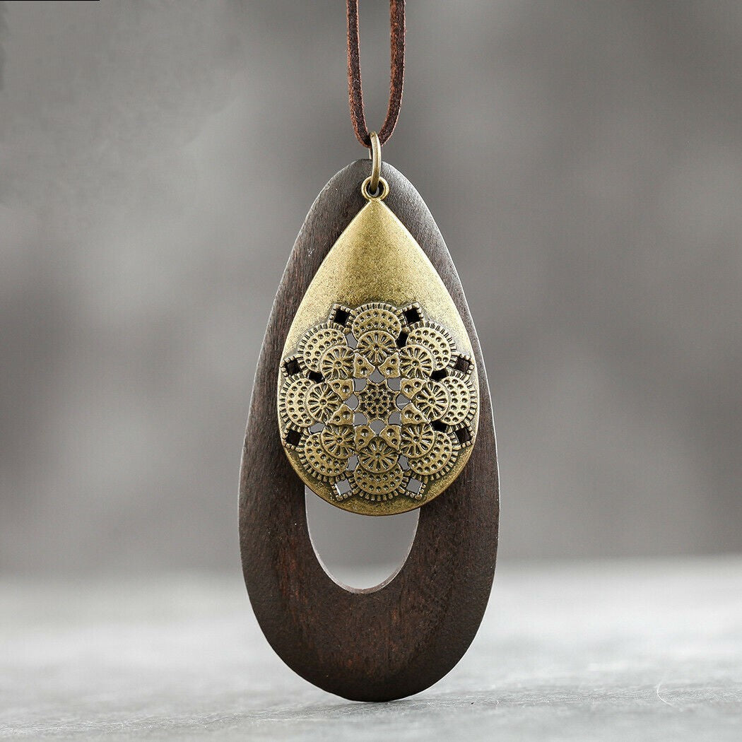 Eco-friendly women's oval wood pendant necklace, natural bohemian jewelry.