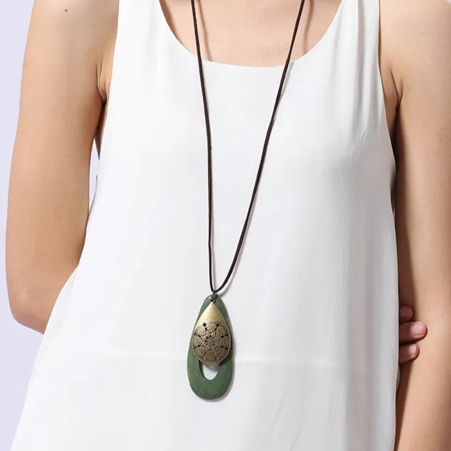 Bohemian women's oval wood necklace, natural wooden pendant, eco-friendly style.