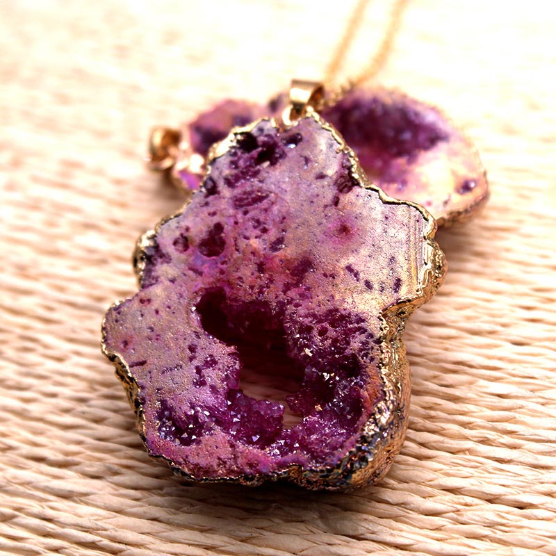 Elegant women's geode jewelry: 'Gaia' crystal pendant with natural stone and healing crystal properties.
