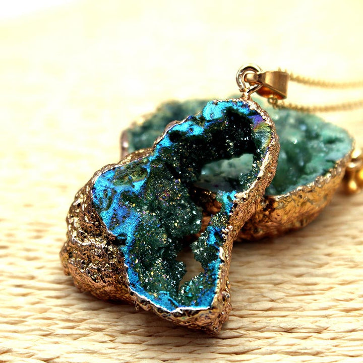 Unique women's 'Gaia' crystal pendant, natural stone geode jewelry with sparkling interior detail.