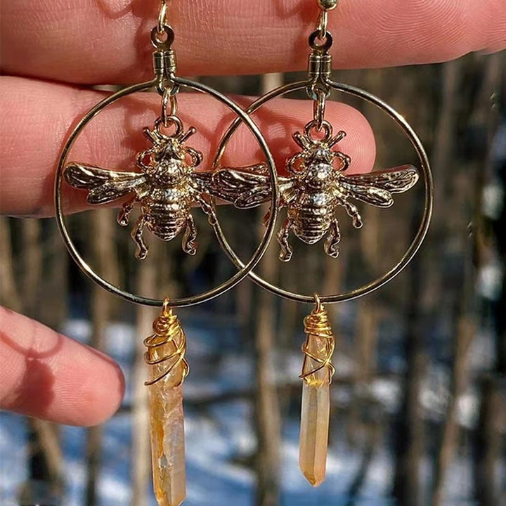 Women's natural crystal moon and star drop earrings, elegant celestial jewelry.