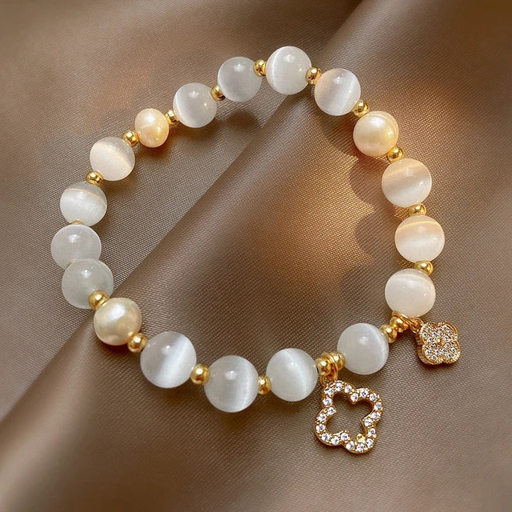 Women's natural crystal & pearl healing bracelet. Adjustable gold plated chain, spiritual jewelry for women.