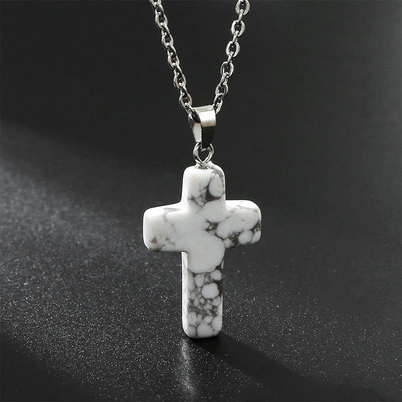 Front view of women's natural gemstone cross pendant. Beautiful and inspiring necklace.