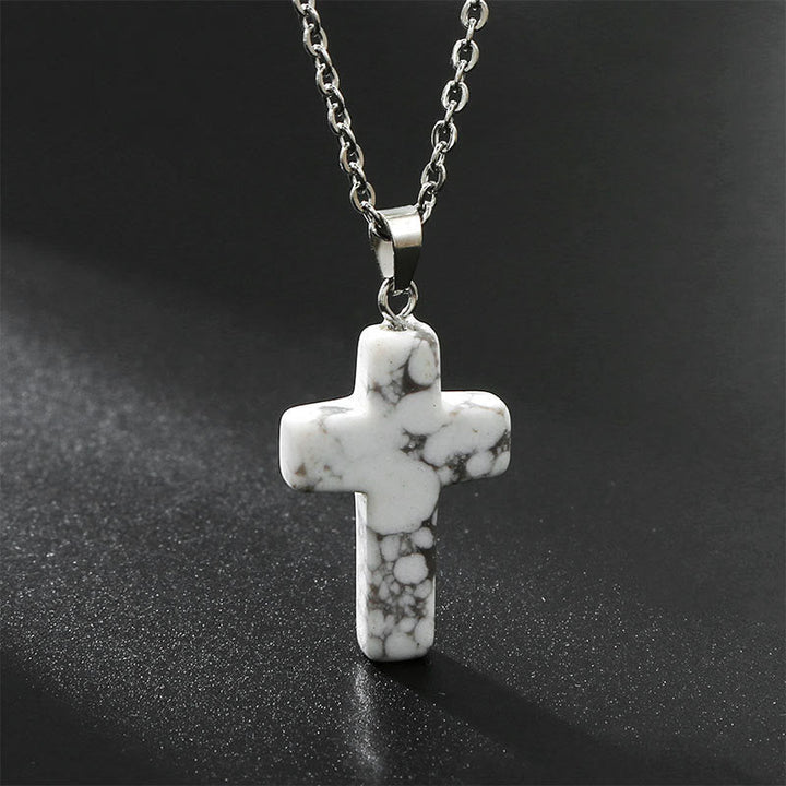 Front view of women's natural gemstone cross pendant. Beautiful and inspiring necklace.