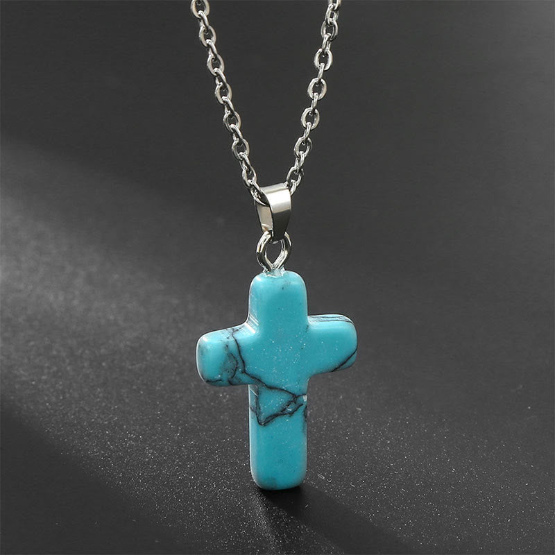 Elegant women's natural stone cross necklace, a symbolic and stylish fashion accessory.